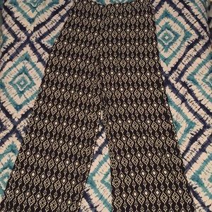 Flowy pants with white diamond design.